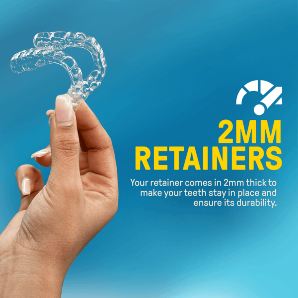 A hand holding up clear retainers with words that say 2 mm thick